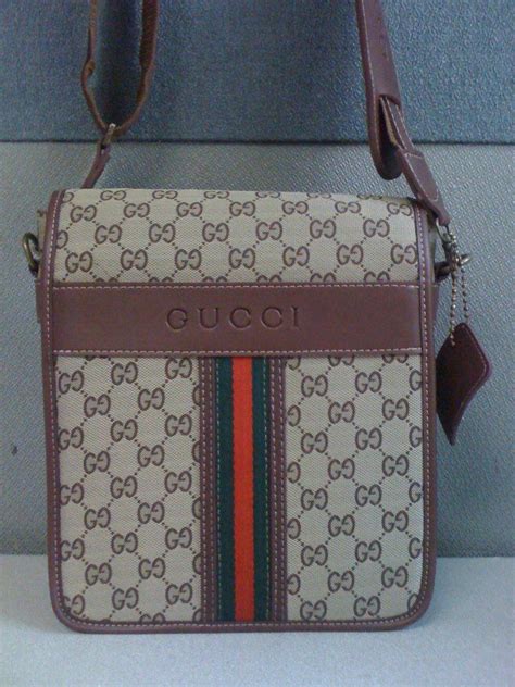 bulto de hombre gucci|Bolsos Gucci de hombre .